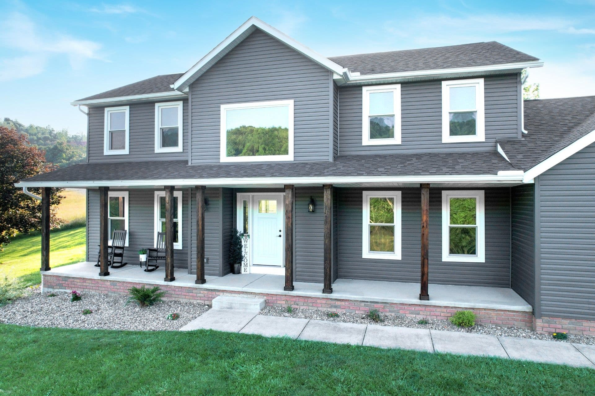 Endure White Picture and Double Hung Windows on house with grey siding