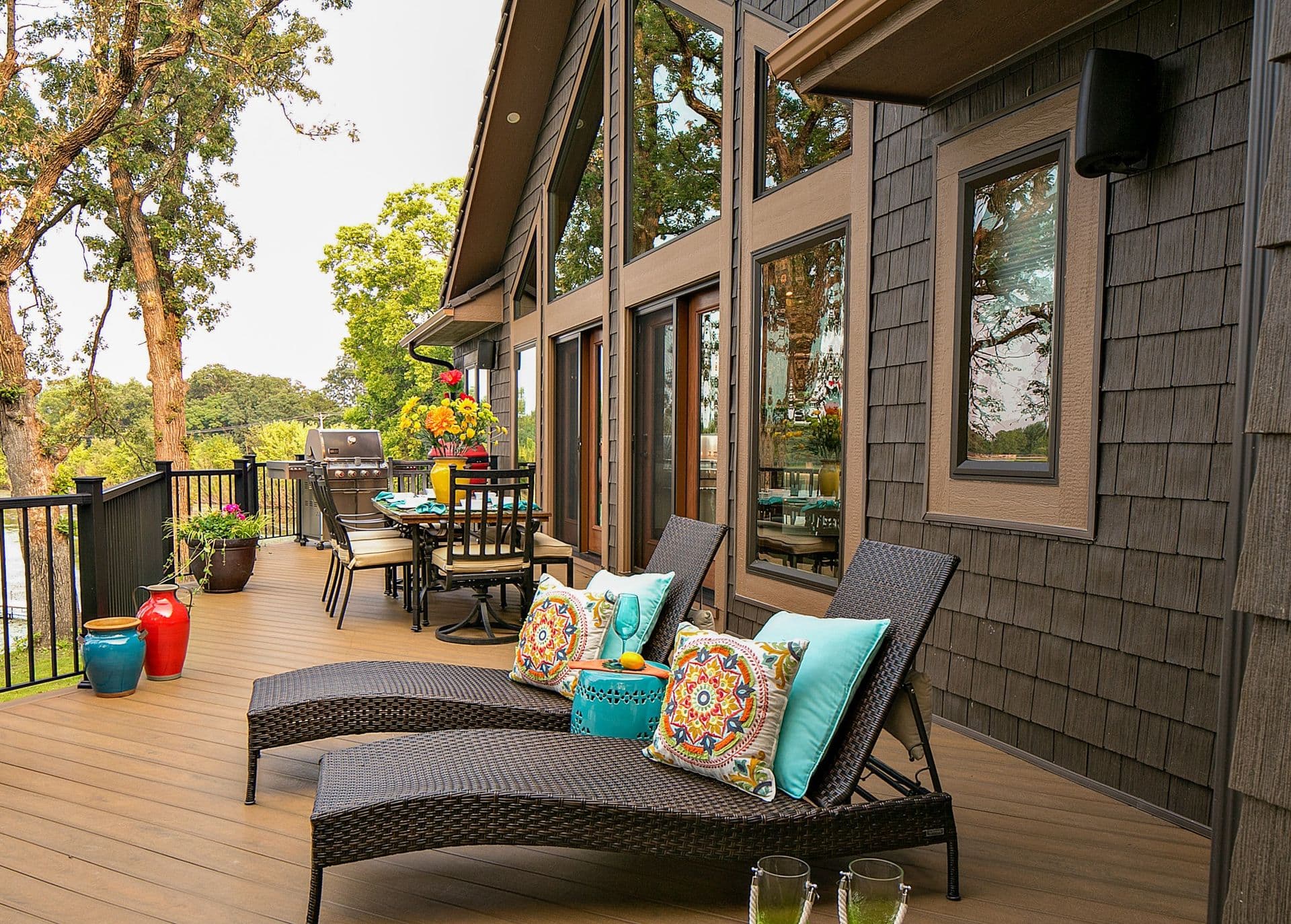 Brown house with brown patio and windows