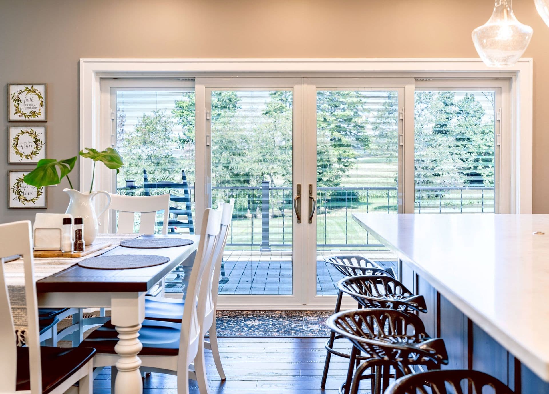 Sliding Glass doors in kitchen leading to patio